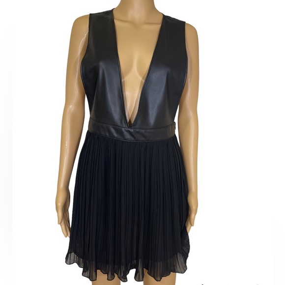 Zara Dresses & Skirts - Zara Black Faux Leather dress with pleated skirt